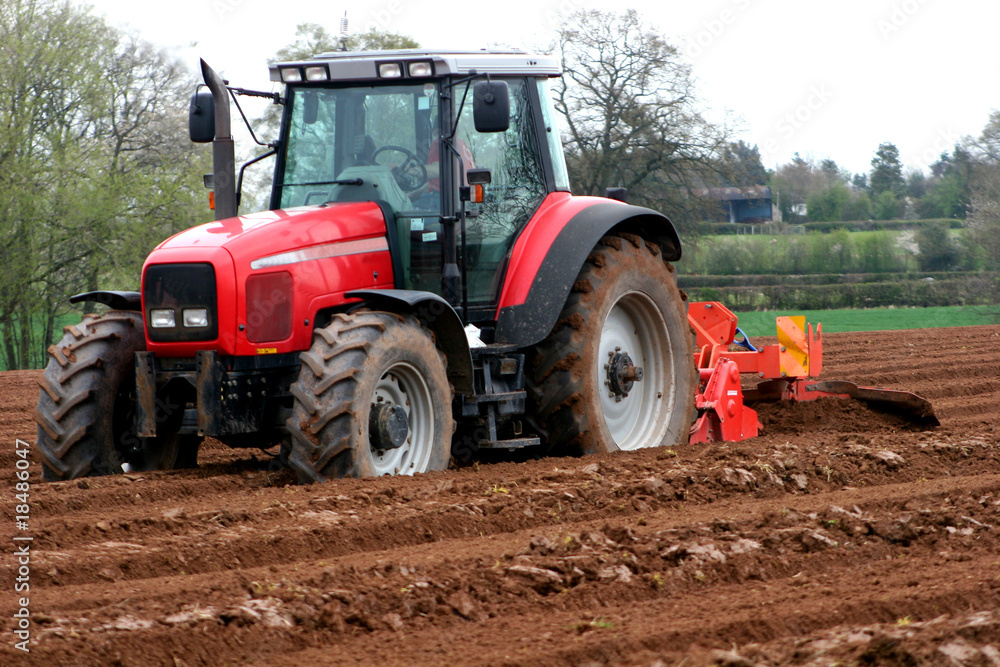Fototapeta premium tractor ploughing