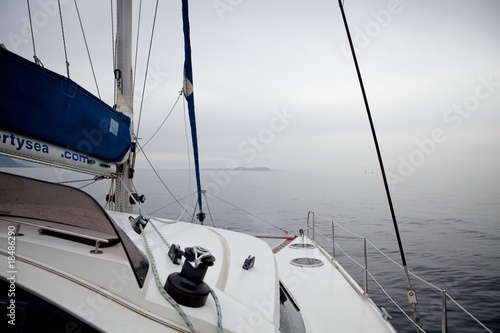 cloudy catamaran cruise in the sea