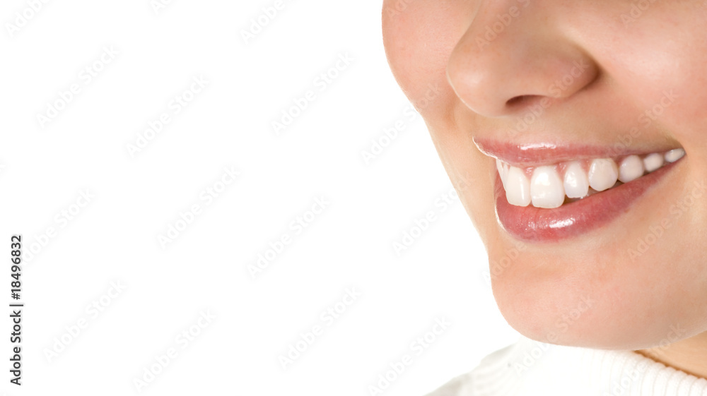 Obraz premium smiling young girl mouth with great teeth (isolated on white)