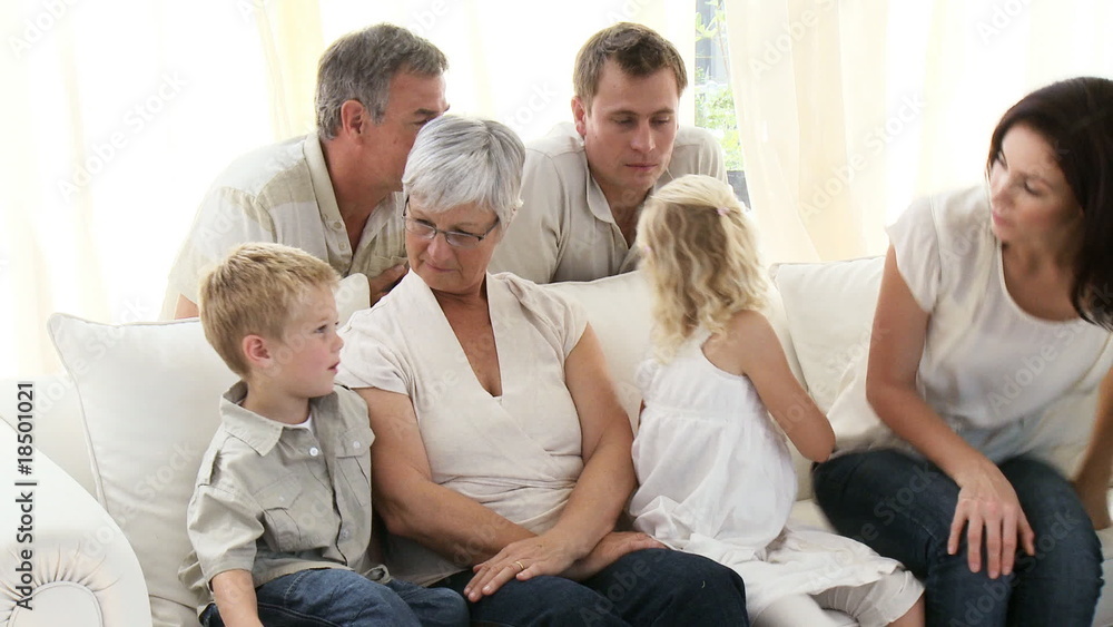 Happy Family sitting on the sofa Happy Family sitting on the sofa