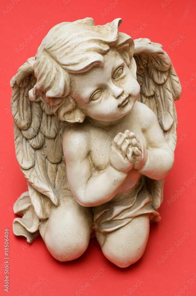 Praying angel looking sideways Praying angel looking sideways