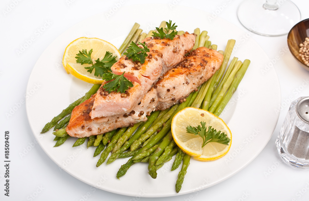 healthy salmon with coriander garnished with asparagus healthy salmon with coriander garnished with asparagus