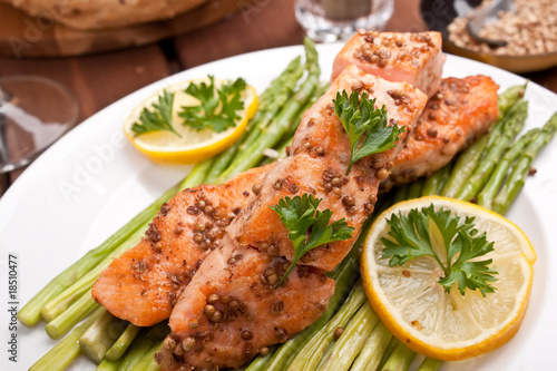 healthy salmon with coriander garnished with asparagus