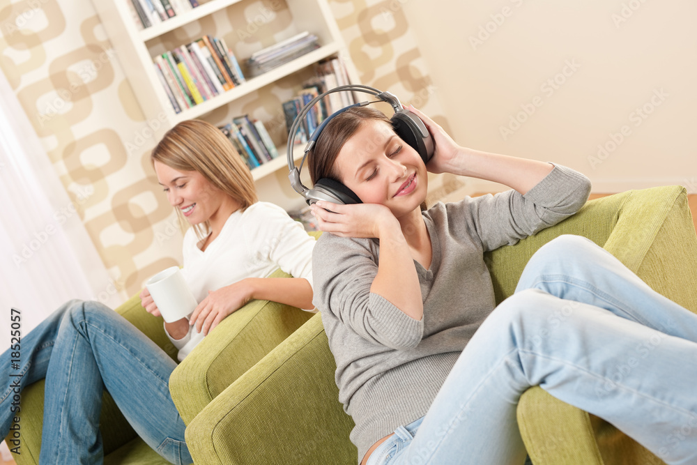 Students - Two female teenager relaxing in lounge Students - Two female teenager relaxing in lounge