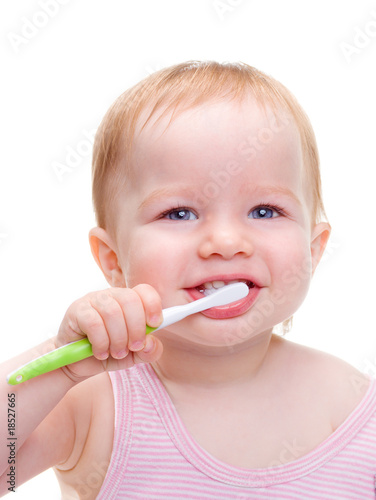 Girl with toothbrush isolated