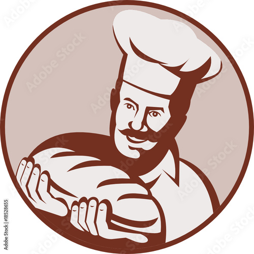 Chef baker holding loaf of bread