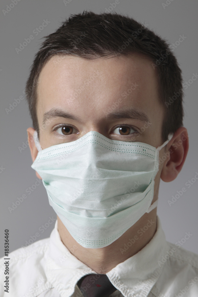 young man with medical mask young man with medical mask