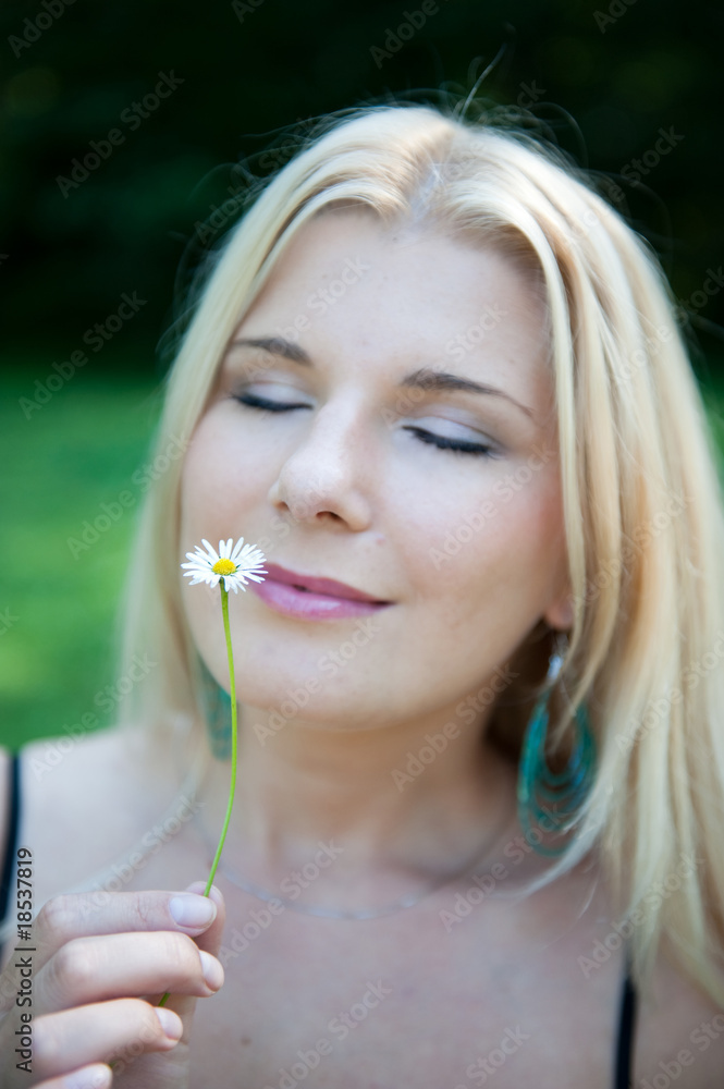 Young sexy spring woman with small flower Young sexy spring woman with small flower