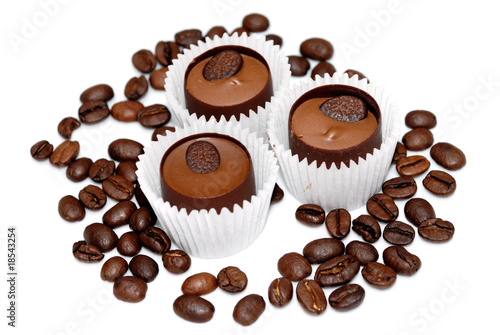 Sweet and coffee beans isolated
