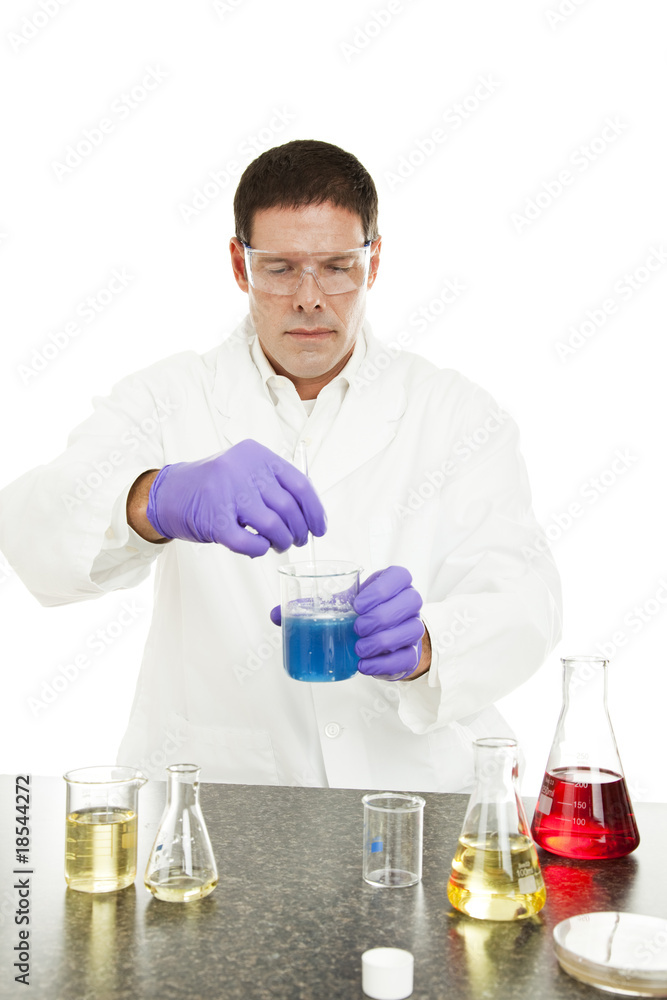 Scientist Mixes Compound in Lab Scientist Mixes Compound in Lab