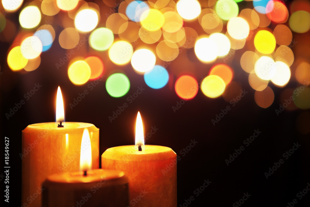 Christmas candle with blurred light Christmas candle with blurred light