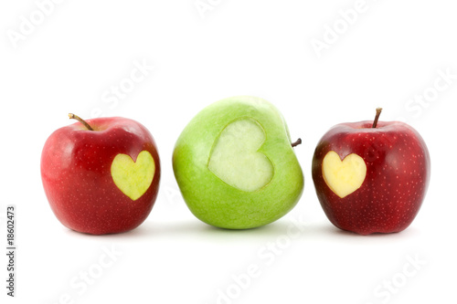 apples with a heart isolated on white