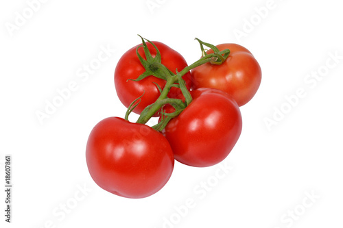Bunch of four red ripe tomatoes