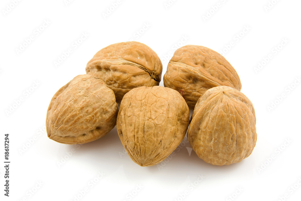 some walnuts over white background some walnuts over white background