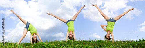 Young girl doing cartwheel