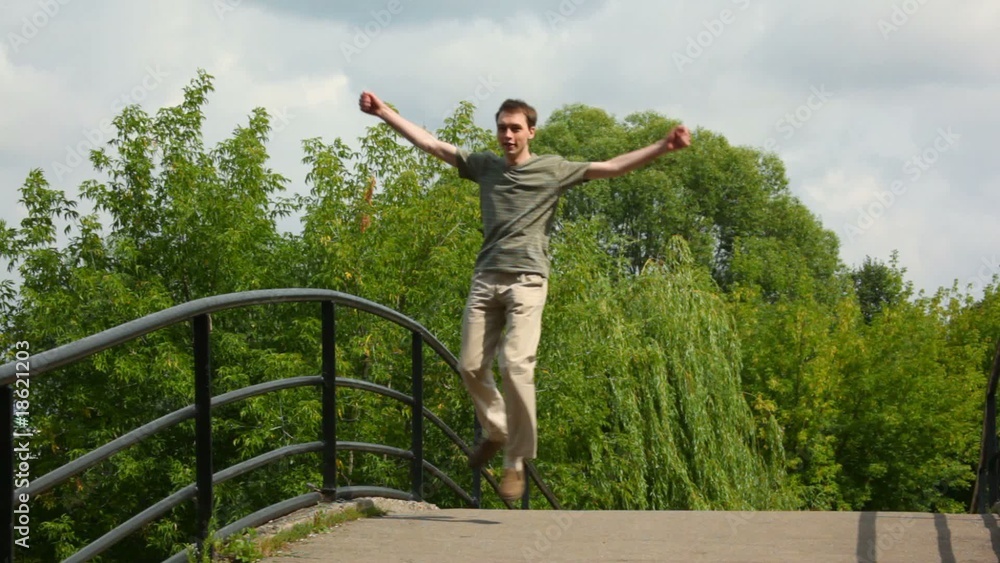 happy young men jumping happy young men jumping