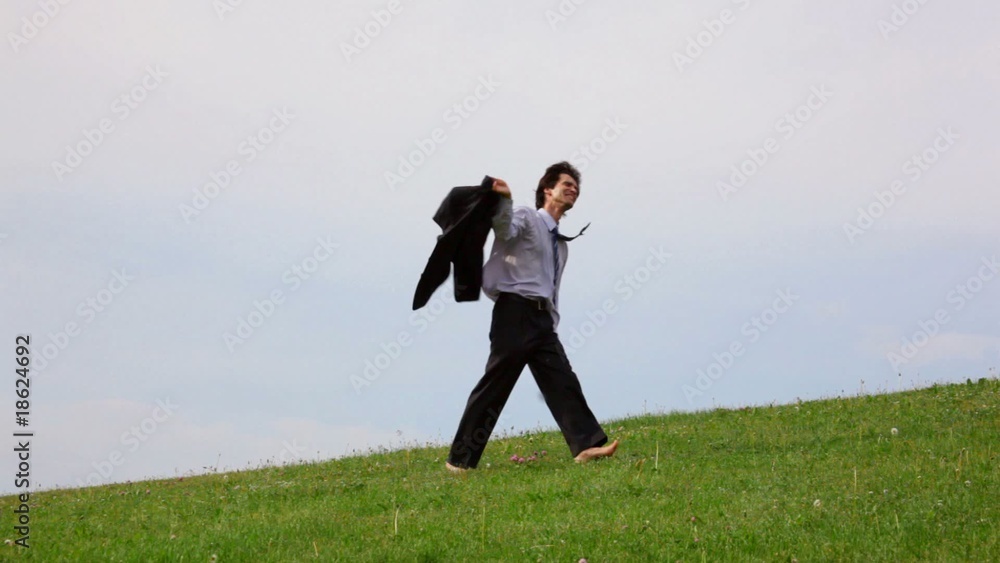 handsome man without shoes waving coat handsome man without shoes waving coat