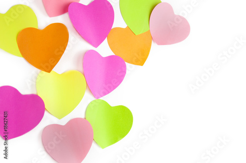 colors note papers hearts on white wall
