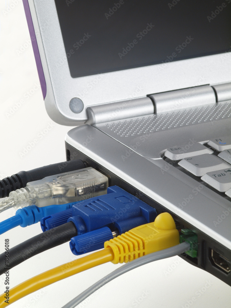 Laptop with screen and muliti color plugged in ports Laptop with screen and muliti color plugged in ports