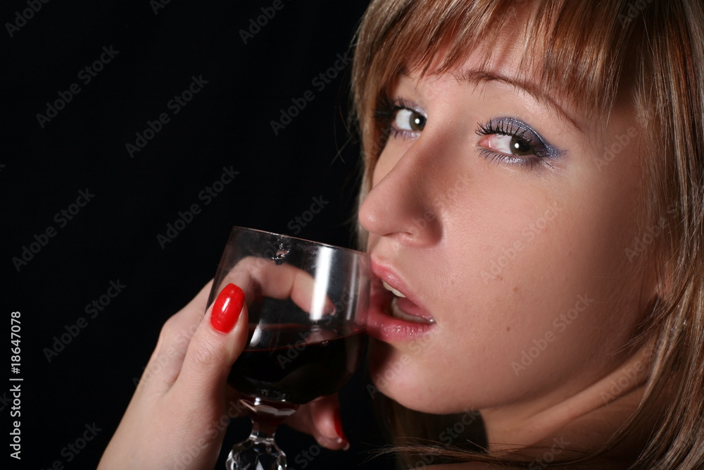 blonde posing with a beaker of wine blonde posing with a beaker of wine