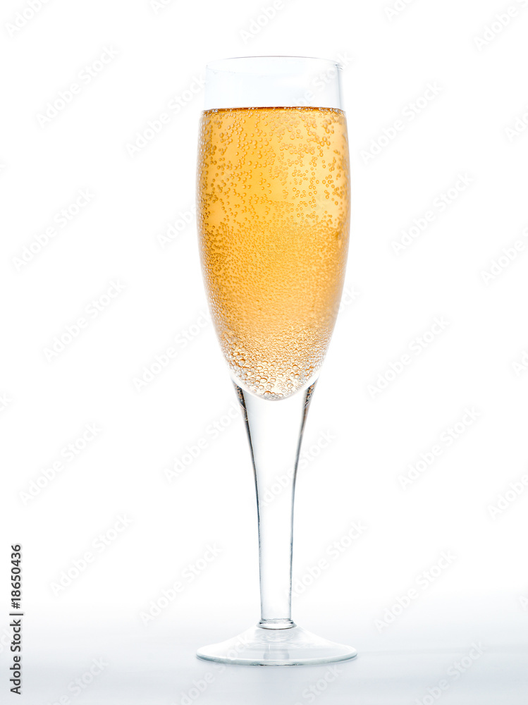 Closeup of the bubbles in a glass of champagne Closeup of the bubbles in a glass of champagne