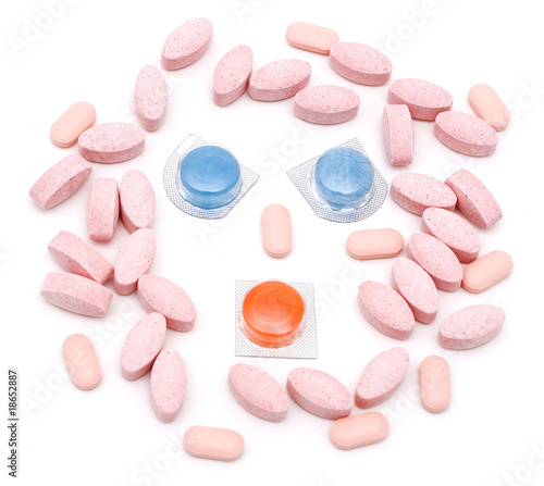 Various Kinds of Drugs or Pills laid out in a form of face
