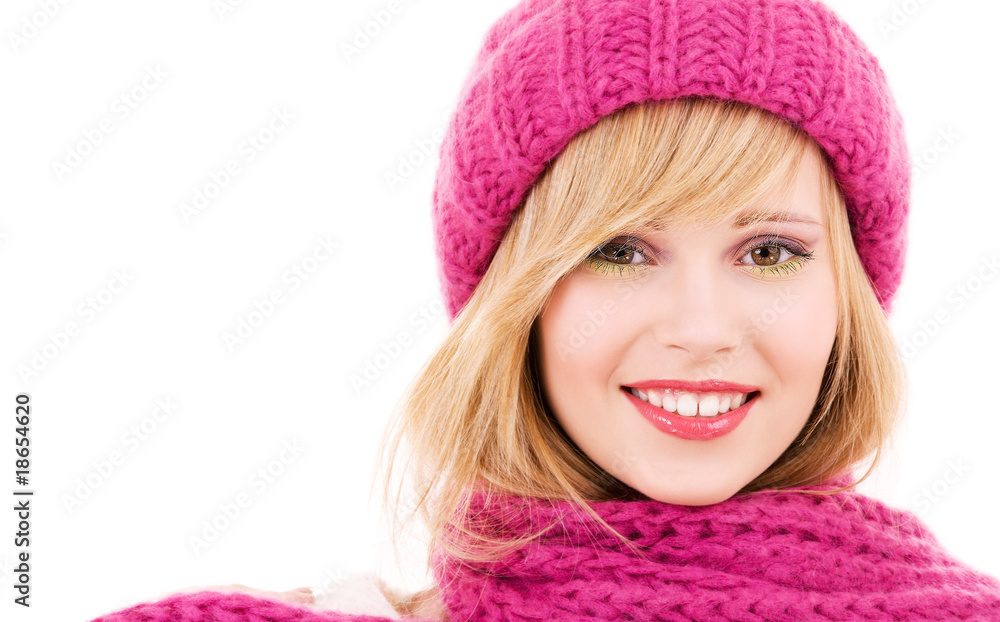 happy teenage girl in winter hat over white happy teenage girl in winter hat over white