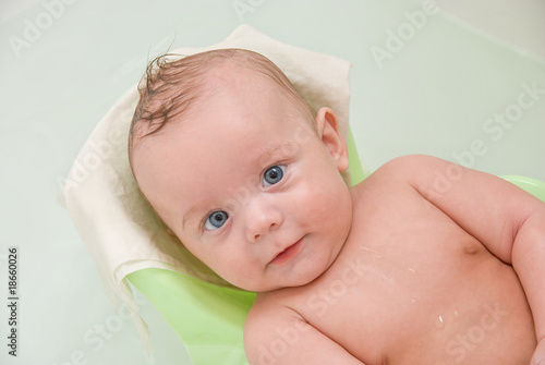baby boy having bath