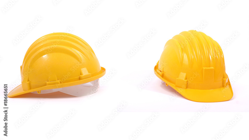 Fototapeta premium Isolated yellow protective helmets