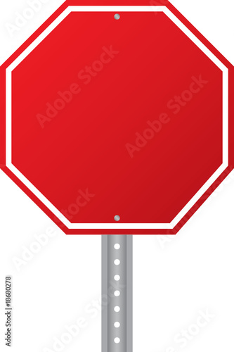 Blank red octagon road sign isolated on white