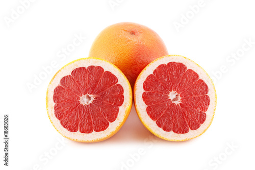 fresh grapefruit fruit with cut isolated on white
