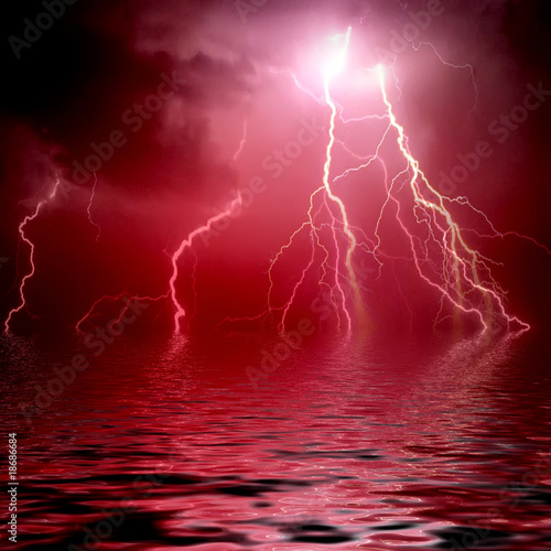 Lightning reflecting in water