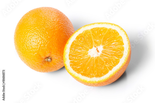 One and half oranges on the white background