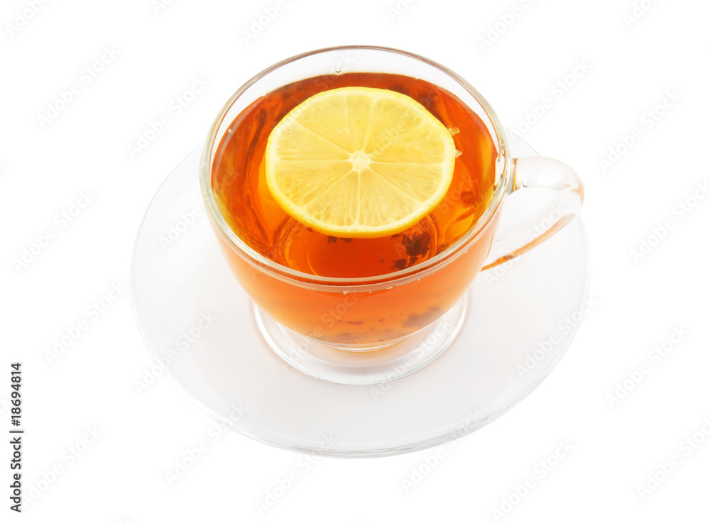Glass cup of tea with lemon isolated on white Glass cup of tea with lemon isolated on white