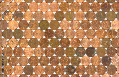 Several rows of older and newer one cent coins