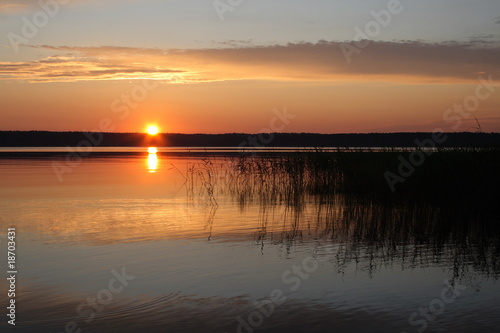 sunset on the lake. © Valuykin S.