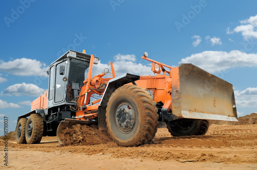 road grader bulldozer