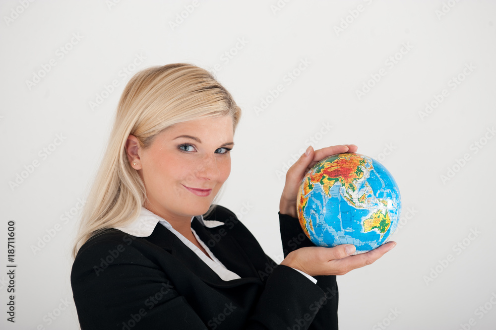 Young business woman with a planet globe Young business woman with a planet globe