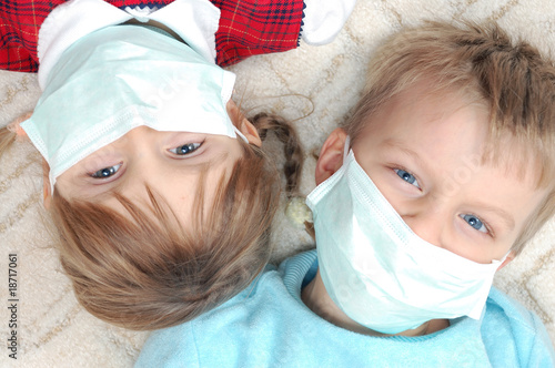 kids with madicine protective masks photo