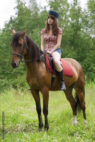 Brunette girl with horse