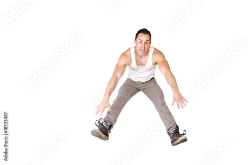 Portrait of a handsome young man jumping