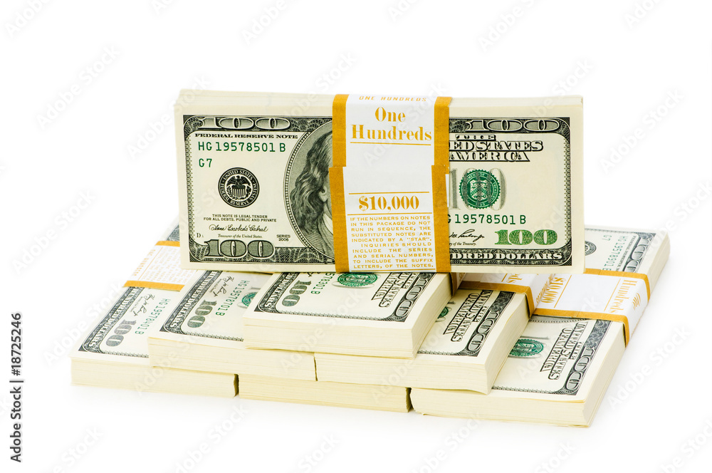 Stack of dollars isolated on the white Stack of dollars isolated on the white