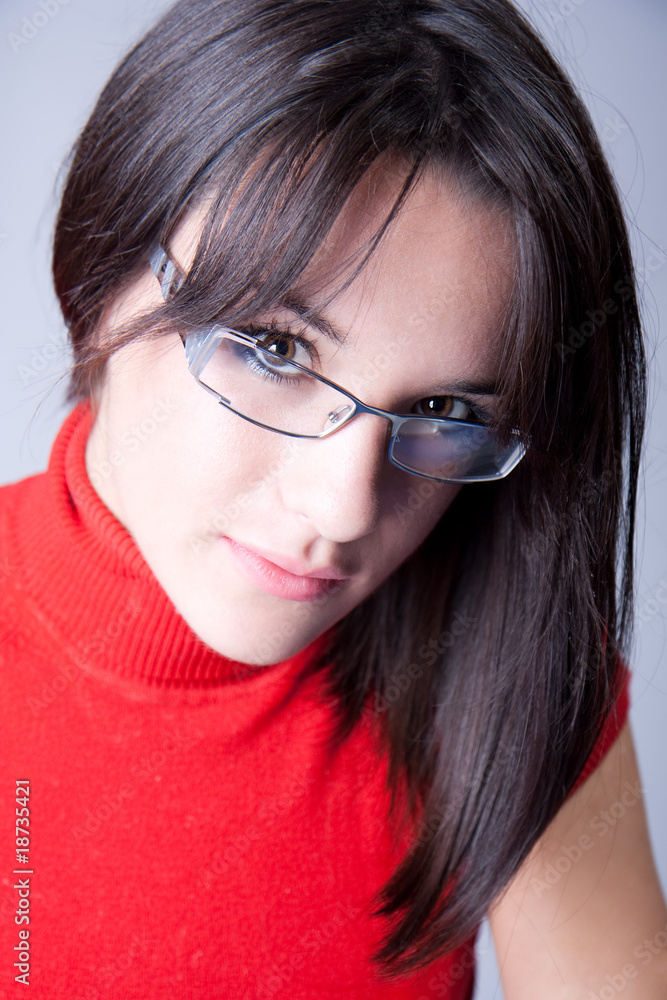 a Beautiful business woman with glasses a Beautiful business woman with glasses