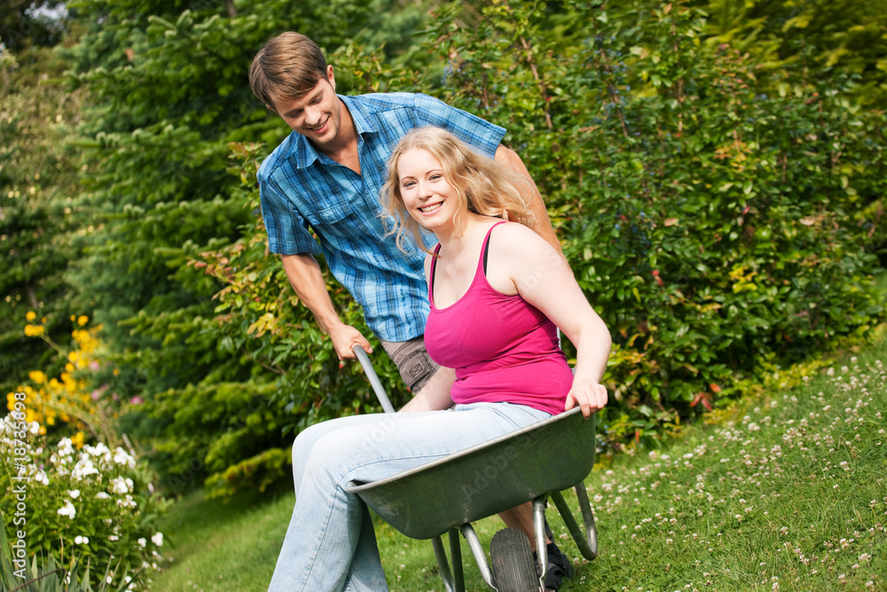 Fototapeta premium Country life – couple with wheelbarrow
