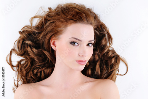 attractive young woman with curly hairs