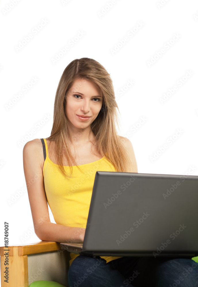 Naklejka premium Young blond woman with computer