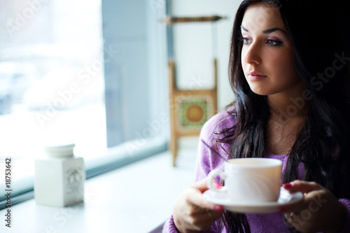 girl with a cup of tea