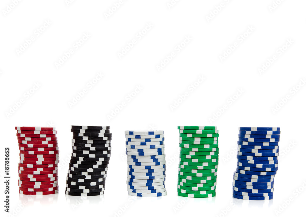 Stacks of poker chips on white with copy space Stacks of poker chips on white with copy space