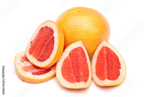 red grapefruit and parts of it isolated on white background
