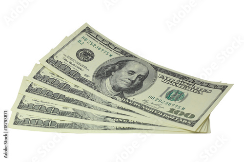 Five hundred dollar bills lying on a white background